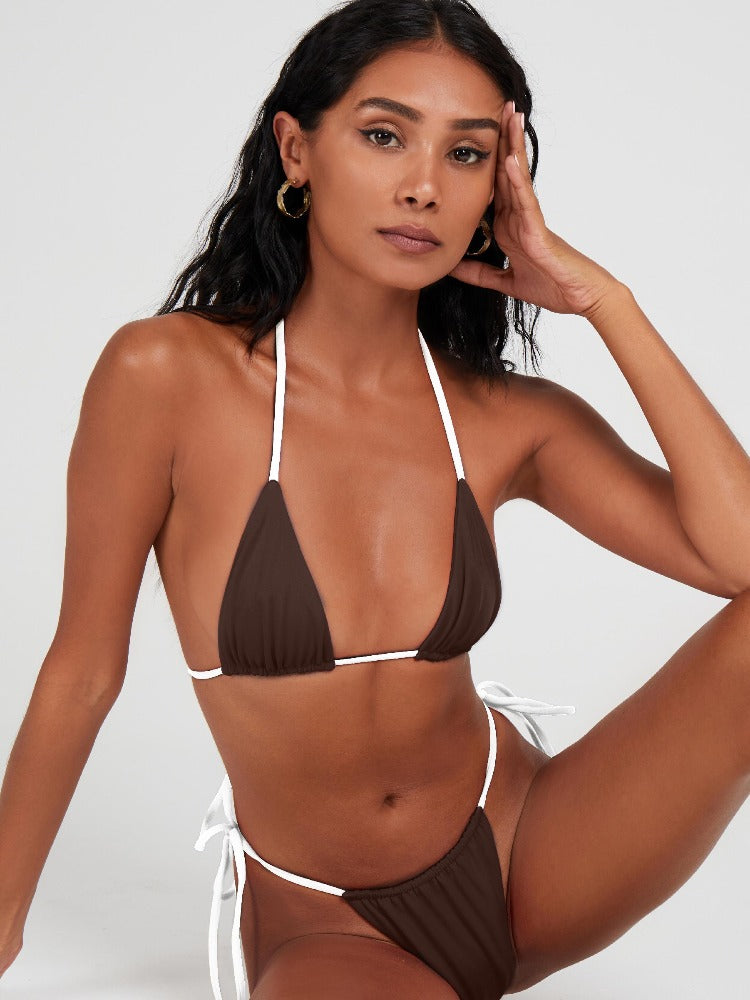 Salty Nips' Alysia Esra Micro String Bikini in coco and cream, our top-selling set. Adjustable, hand-finished, and tailored for a perfect fit, it's the epitome of beach chic.
