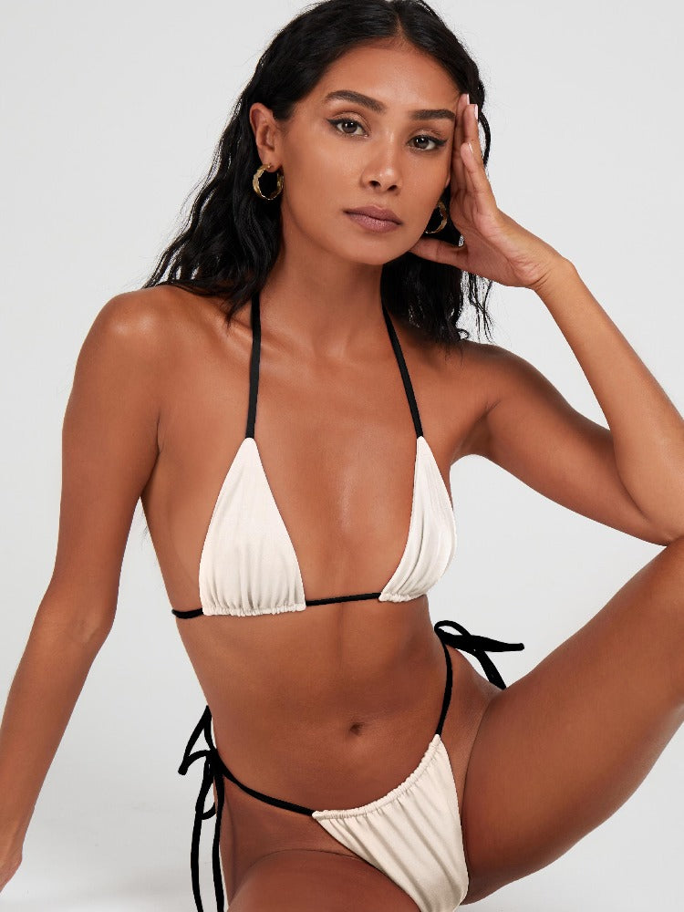 Saltynips.co's Monochrome Esra: our top black & white micro string bikini. Adjustable, with contrasting ties, perfect for all shapes.