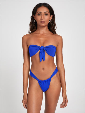Salty Nips' Aria Bandeau in Azure Blue: a captivating front-tie bikini with Brazilian bottoms. Designed for support and minimal tan lines, it's the essence of summer style.