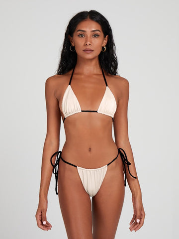 Saltynips.co's Monochrome Esra: our top black & white micro string bikini. Adjustable, with contrasting ties, perfect for all shapes.