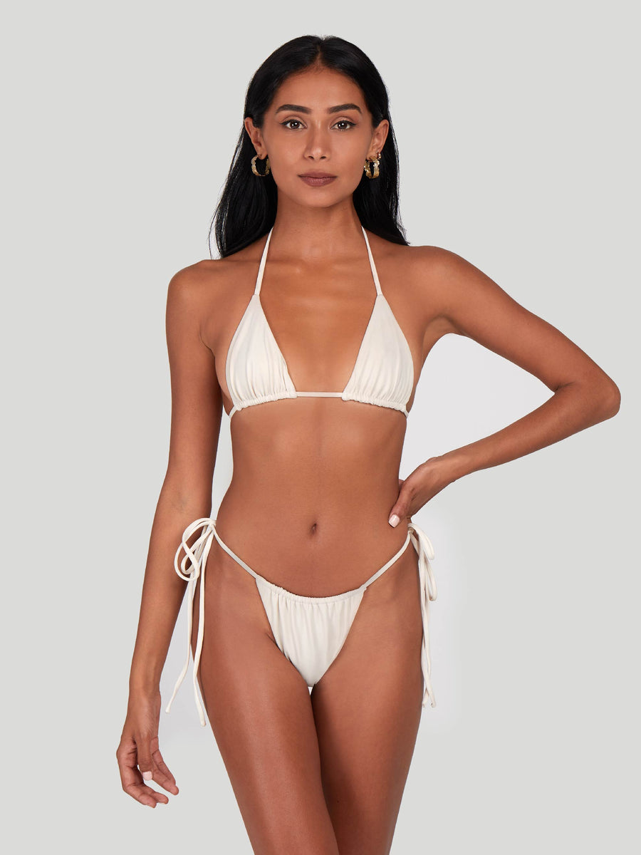 SaltyNips' Cream White Micro Bikini: Adjustable, ruched, and hand-finished for a perfect beach fit. Soft, seamless, and ideal for every body type.