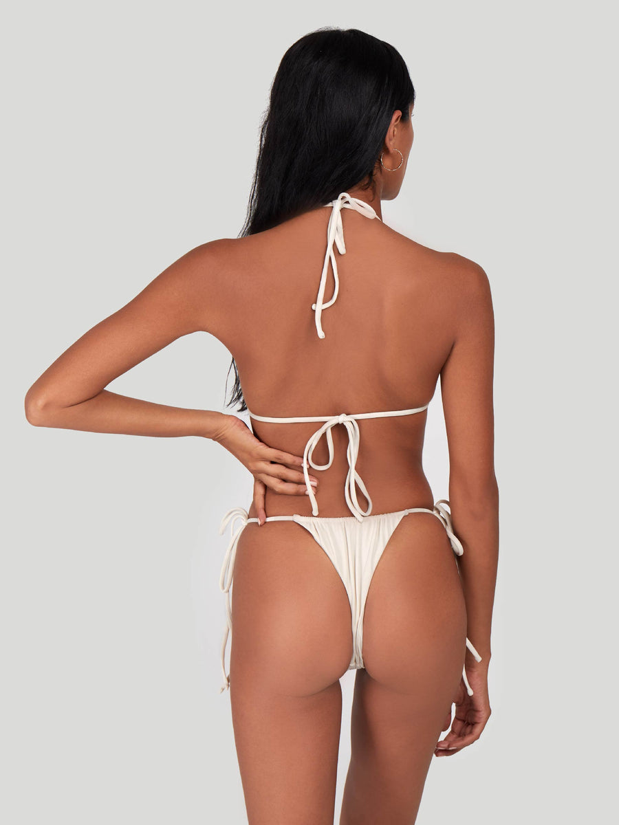 SaltyNips' Cream White Micro Bikini: Adjustable, ruched, and hand-finished for a perfect beach fit. Soft, seamless, and ideal for every body type.