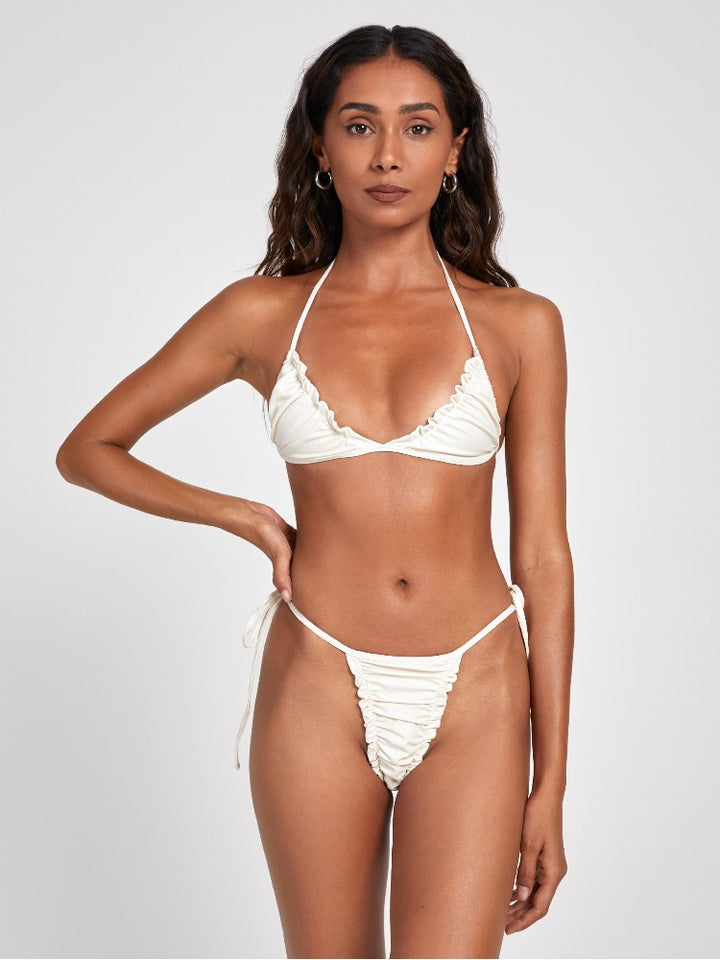 Salty Nips' Ana Ruched Micro Bikini in Ecru features panel ruching and full adjustability. Ideal for beach clubs and sophisticated summer style.